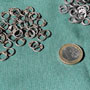 One kilo loose rings 6mm - riveted / oil finish with washer